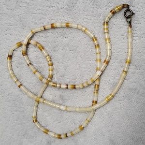 Polished Puka Shell Bead Necklace
